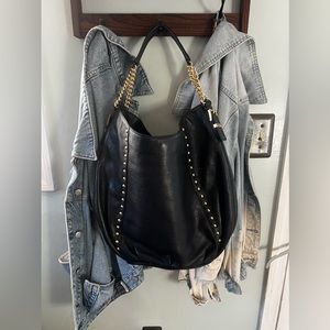 Michael Kors Leather Shoulder Purse with Gold Metal details.